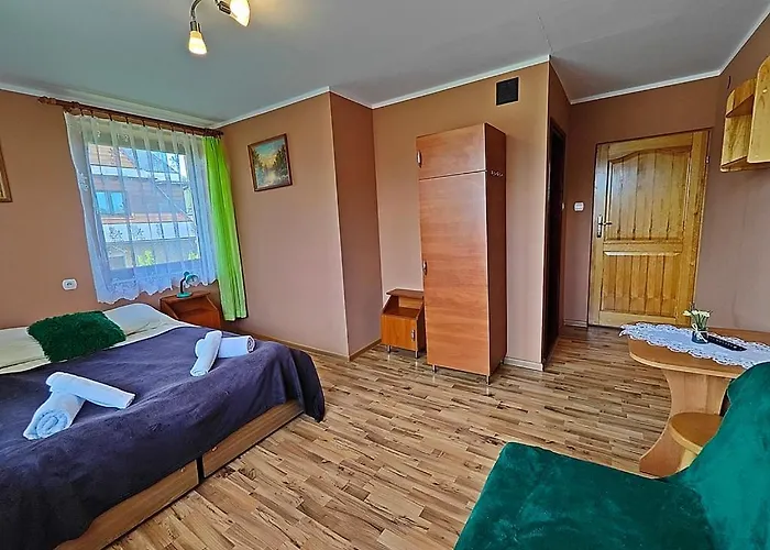 Goscinne Lukaszczyk *