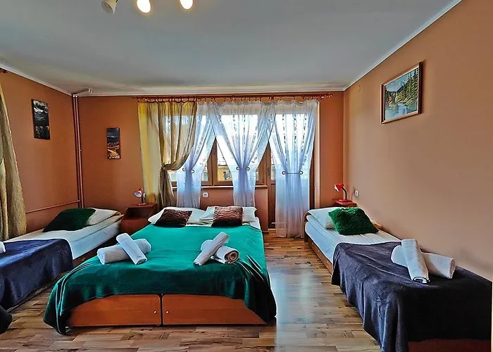 Goscinne Lukaszczyk *